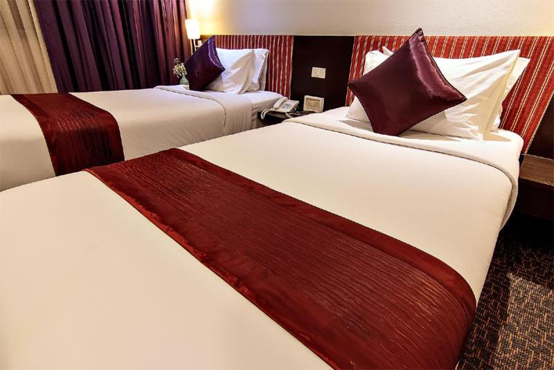 Bossotel Bangkok Habitación foto