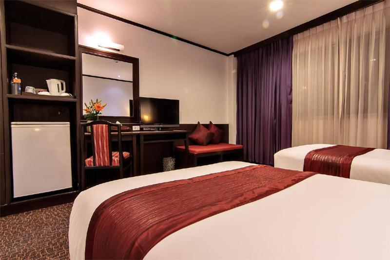 Bossotel Bangkok Habitación foto